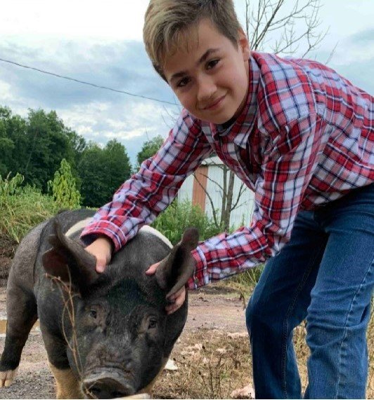 4-H member Garret Dalesky with one of his 2020 4-H Market Hogs participating in the 2020 Wayne County 4-H Virtual Showmanship Show.
